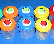 Two sets of buttons partially assembled